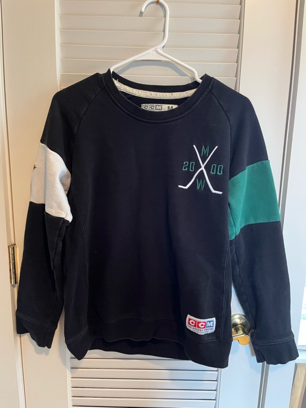 CCM Black Crewneck Sweatshirt with Green and White Accents